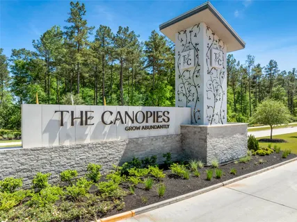 an aerial view of a house with a swimming pool