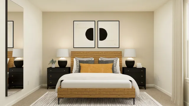 a bedroom with a bed and a table