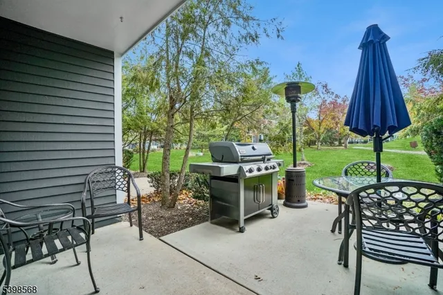 a front view of a building with a garden