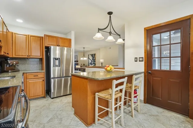 a very nice looking kitchen with a large window