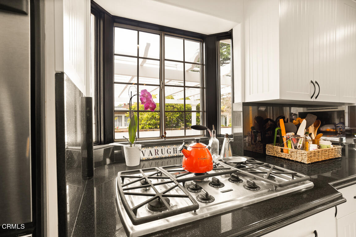 4900 Crown Avenue La Canada Flintridge, CA 91011 - Photo 12 of 41 a living room with furniture and a fireplace