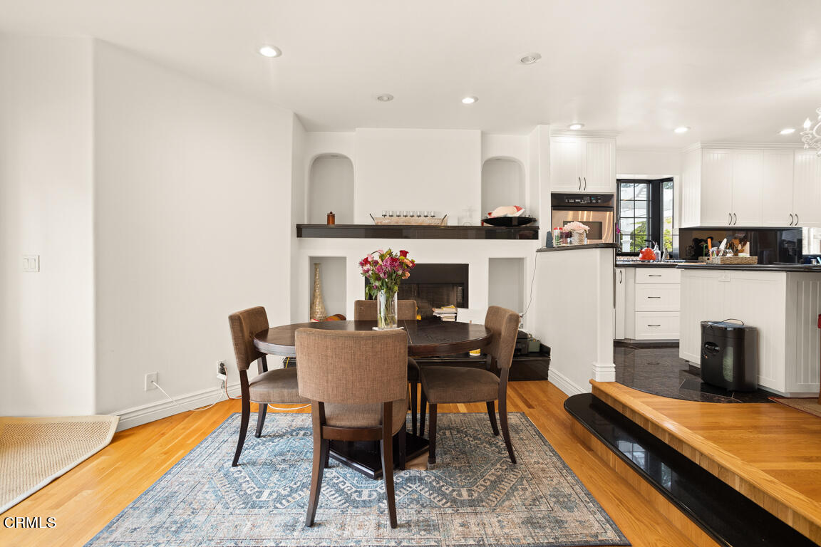4900 Crown Avenue La Canada Flintridge, CA 91011 - Photo 16 of 41 a view of a dining room with furniture and a rug