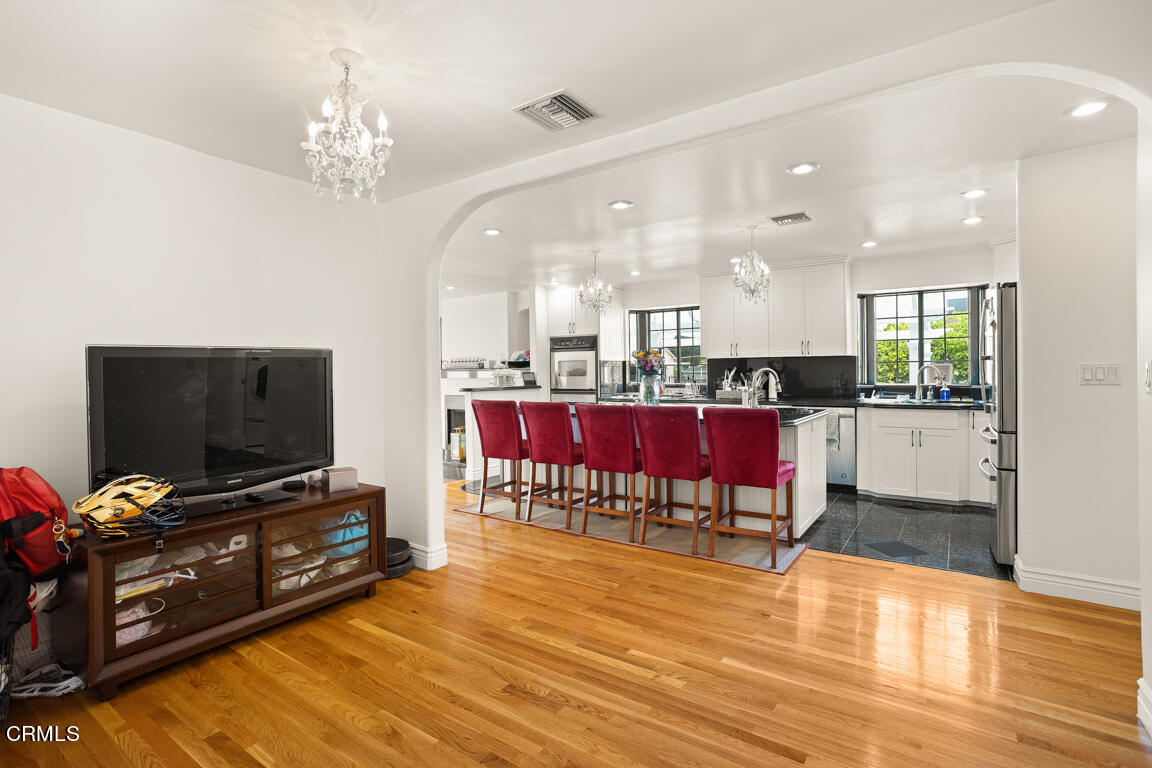 4900 Crown Avenue La Canada Flintridge, CA 91011 - Photo 19 of 41 a living room with furniture and a flat screen tv