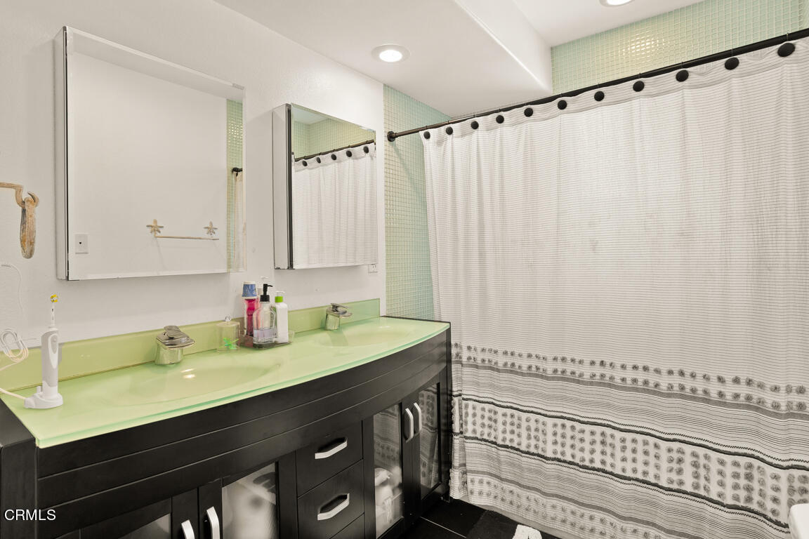 4900 Crown Avenue La Canada Flintridge, CA 91011 - Photo 28 of 41 a bathroom with a sink and a mirror