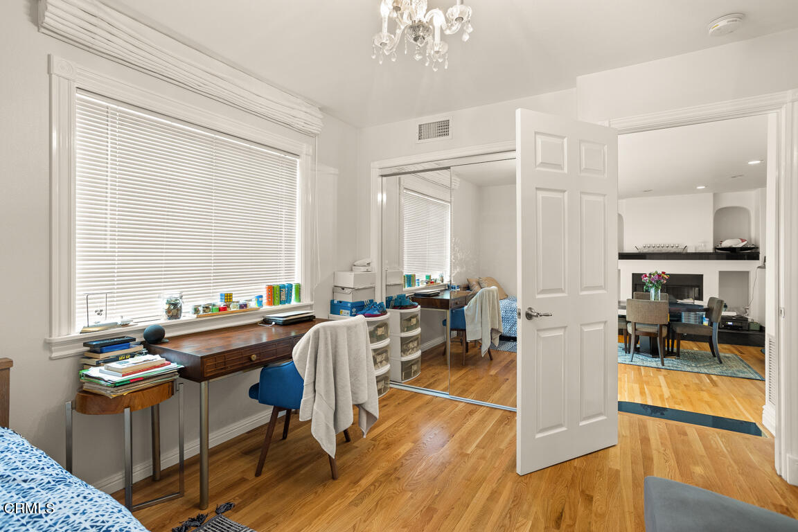 4900 Crown Avenue La Canada Flintridge, CA 91011 - Photo 30 of 41 a view of a dining room with furniture window and wooden floor