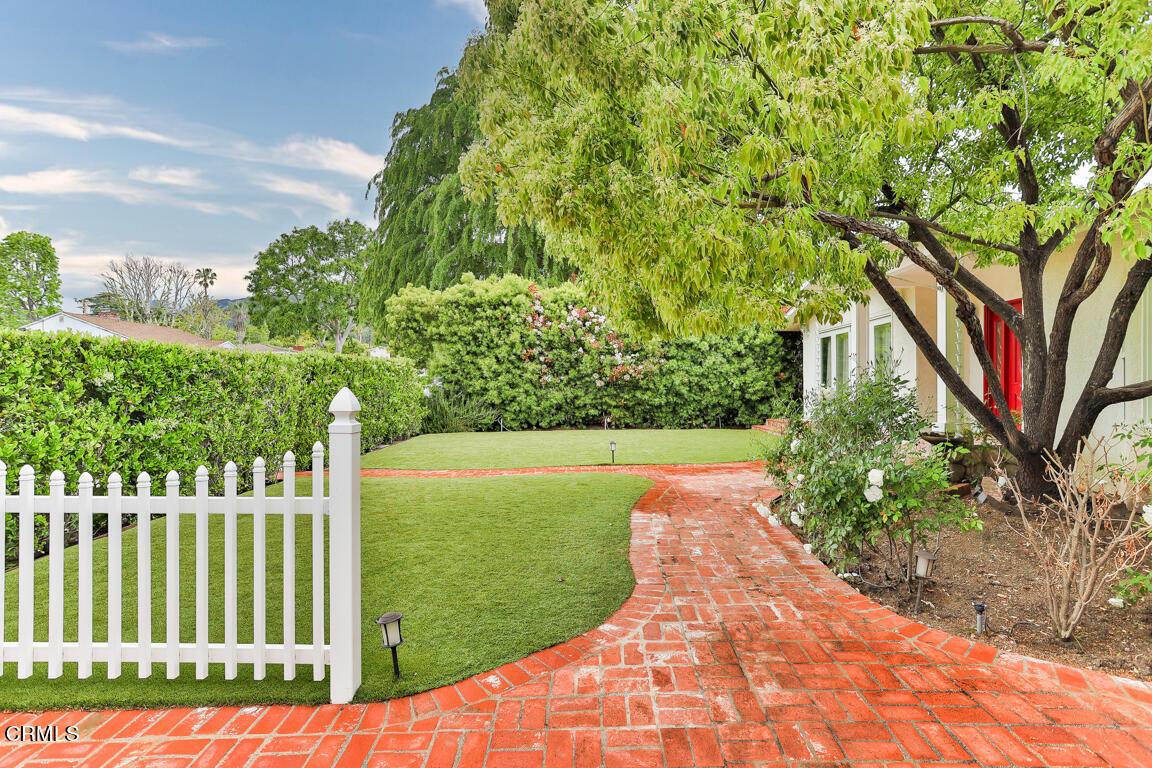 4900 Crown Avenue La Canada Flintridge, CA 91011 - Photo 3 of 41 a view of a yard with plants and large trees