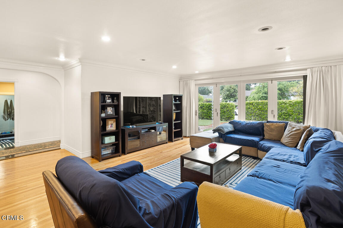 4900 Crown Avenue La Canada Flintridge, CA 91011 - Photo 5 of 41 a living room with furniture and a flat screen tv