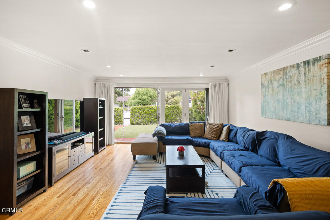 4900 Crown Avenue La Canada Flintridge, CA 91011 - Photo 6 of 41 a living room with furniture and a flat screen tv