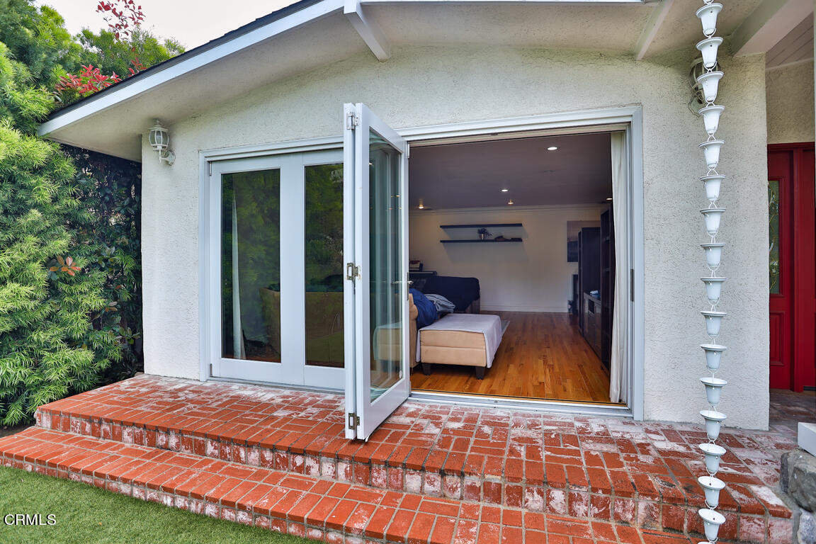 4900 Crown Avenue La Canada Flintridge, CA 91011 - Photo 8 of 41 a view of a bedroom with a bed and balcony