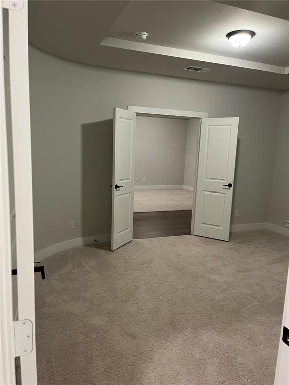 2409 Park Oaks Drive Midlothian, TX 76065 - Photo 13 of 18 an empty room with closet and cabinet