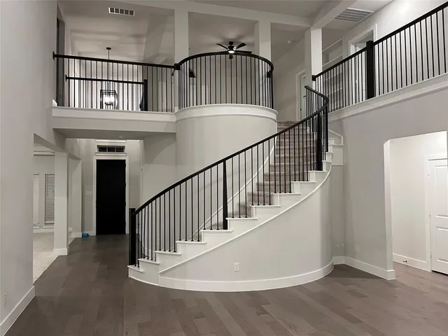 a view of entryway with wooden floor