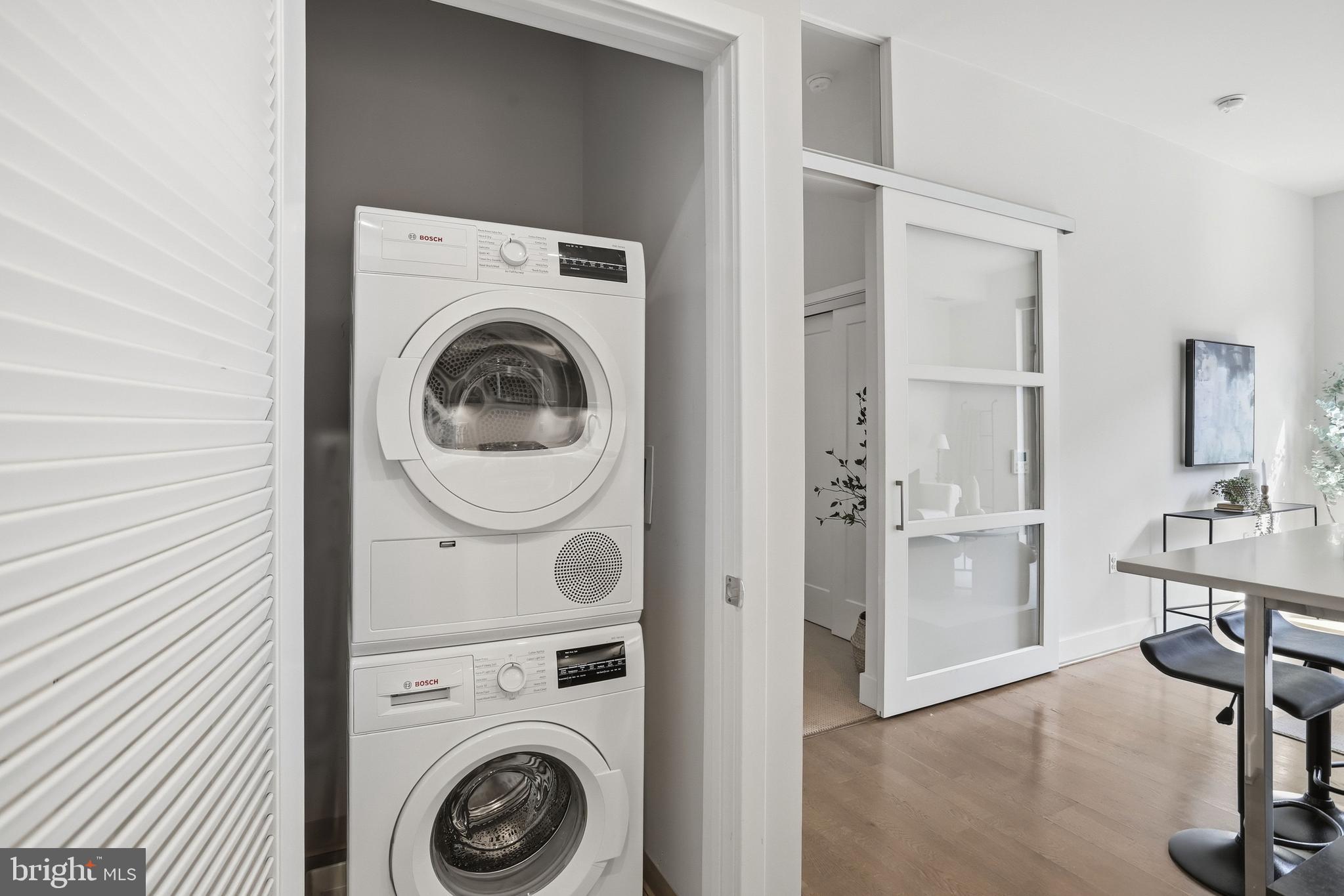 525 Water Street Southwest, Unit 311 Washington, DC 20024 - Photo 12 of 53 a view of a storage & utility room with sink washer and dryer