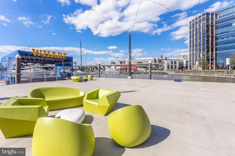 a view of a terrace with sitting area