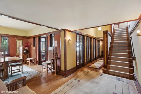 a view of a livingroom with furniture window and wooden floor