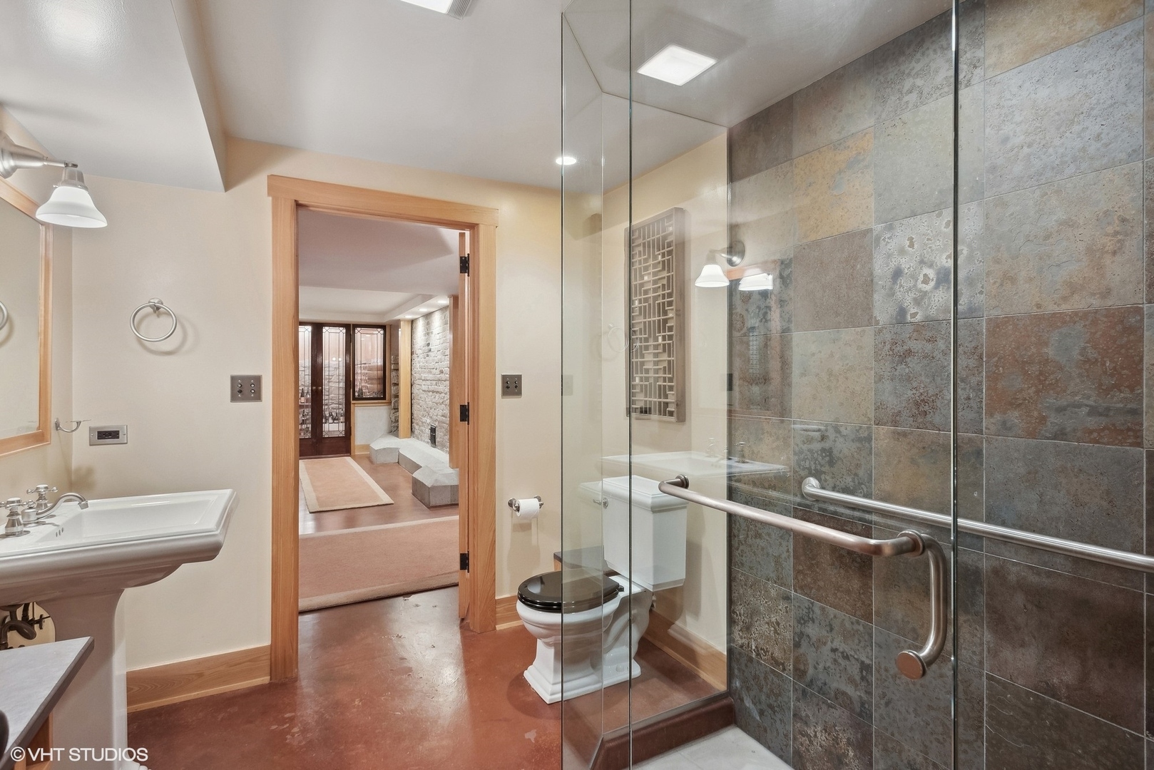 313 Forest Avenue Oak Park, IL 60302 - Photo 30 of 50 a bathroom with a shower a sink and mirror