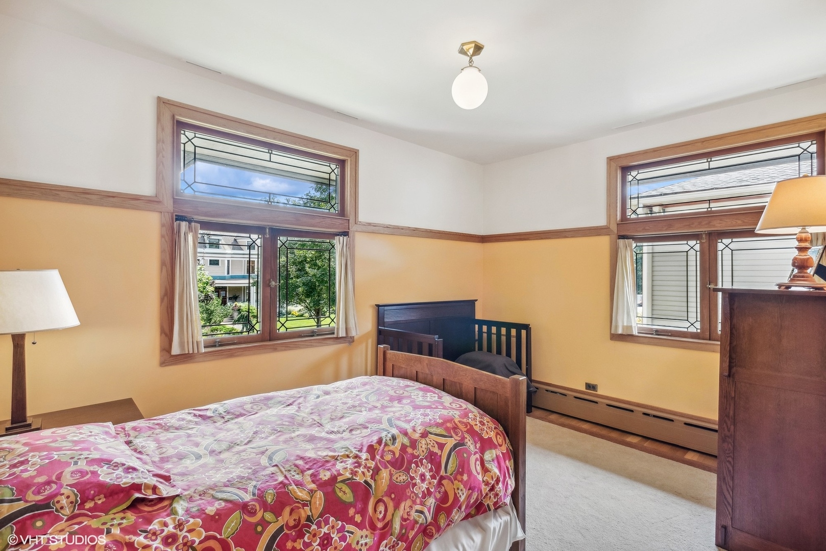 313 Forest Avenue Oak Park, IL 60302 - Photo 39 of 50 a bedroom with a bed wooden floor and a window