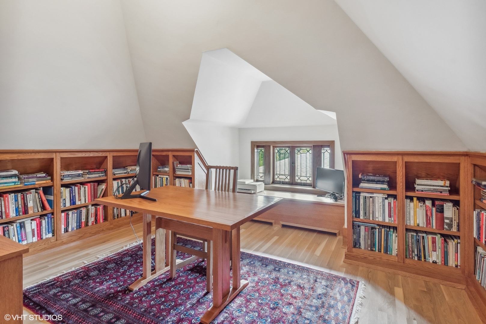 313 Forest Avenue Oak Park, IL 60302 - Photo 42 of 50 a workspace with furniture and book shelf