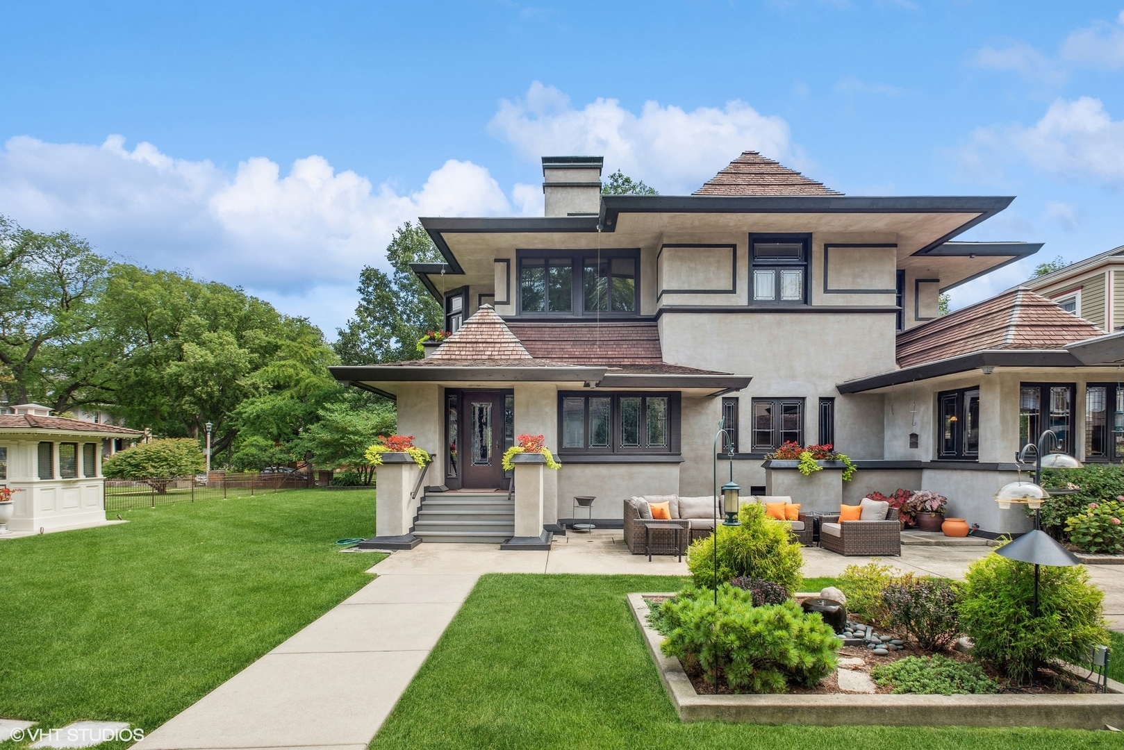 313 Forest Avenue Oak Park, IL 60302 - Photo 45 of 50 a front view of a house with garden and porch