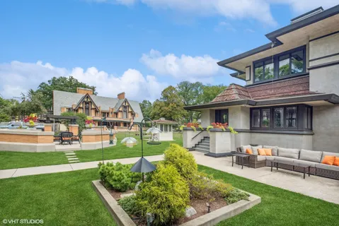 a view of yard with outdoor seating and green space