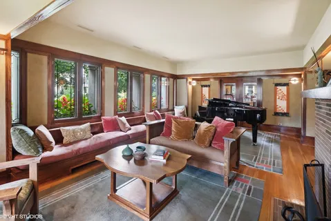 a living room with furniture and a large window