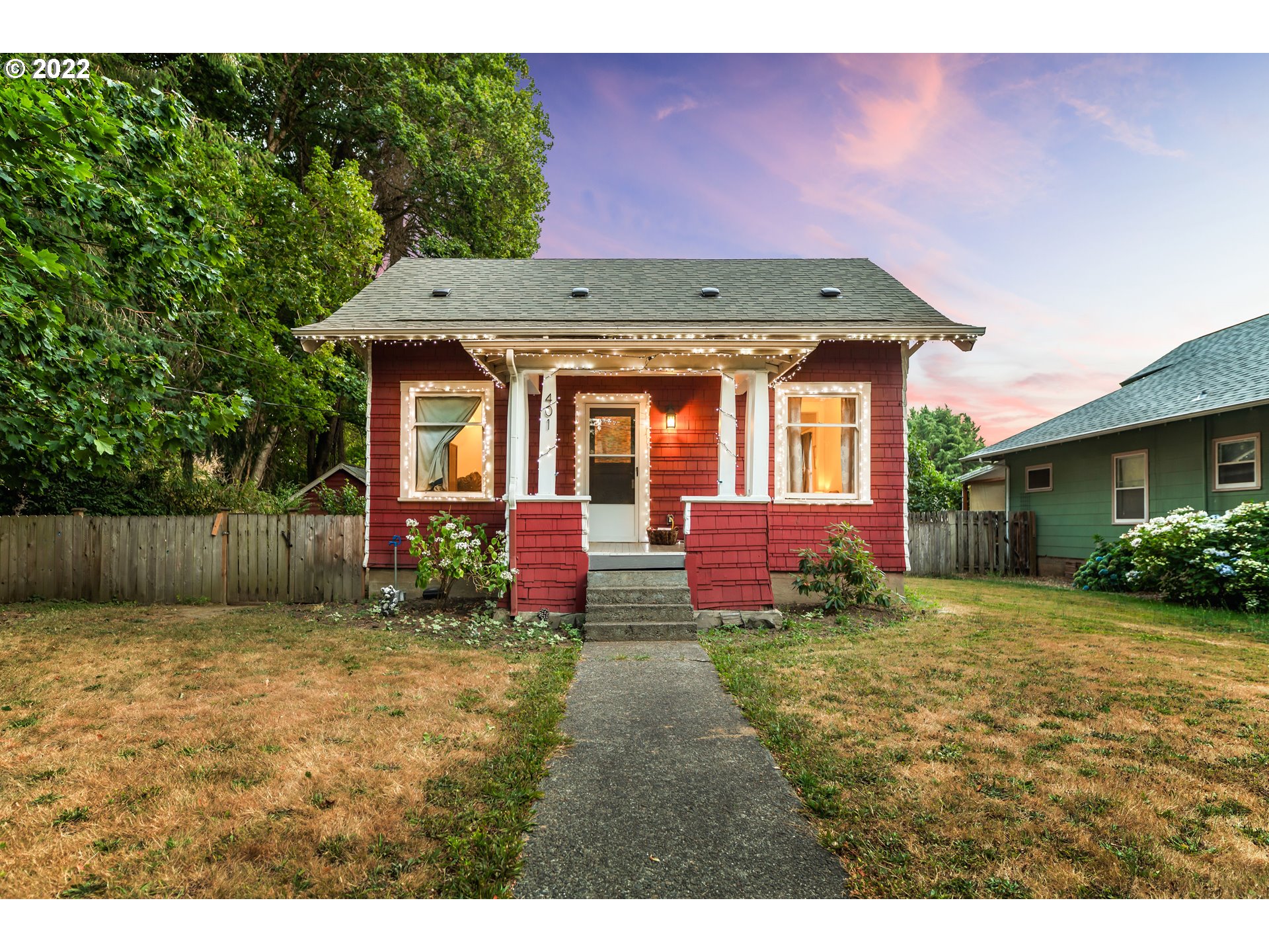 401 Maple Street Ridgefield, WA 98642 - Photo 1 of 31 a front view of house with yard and trees