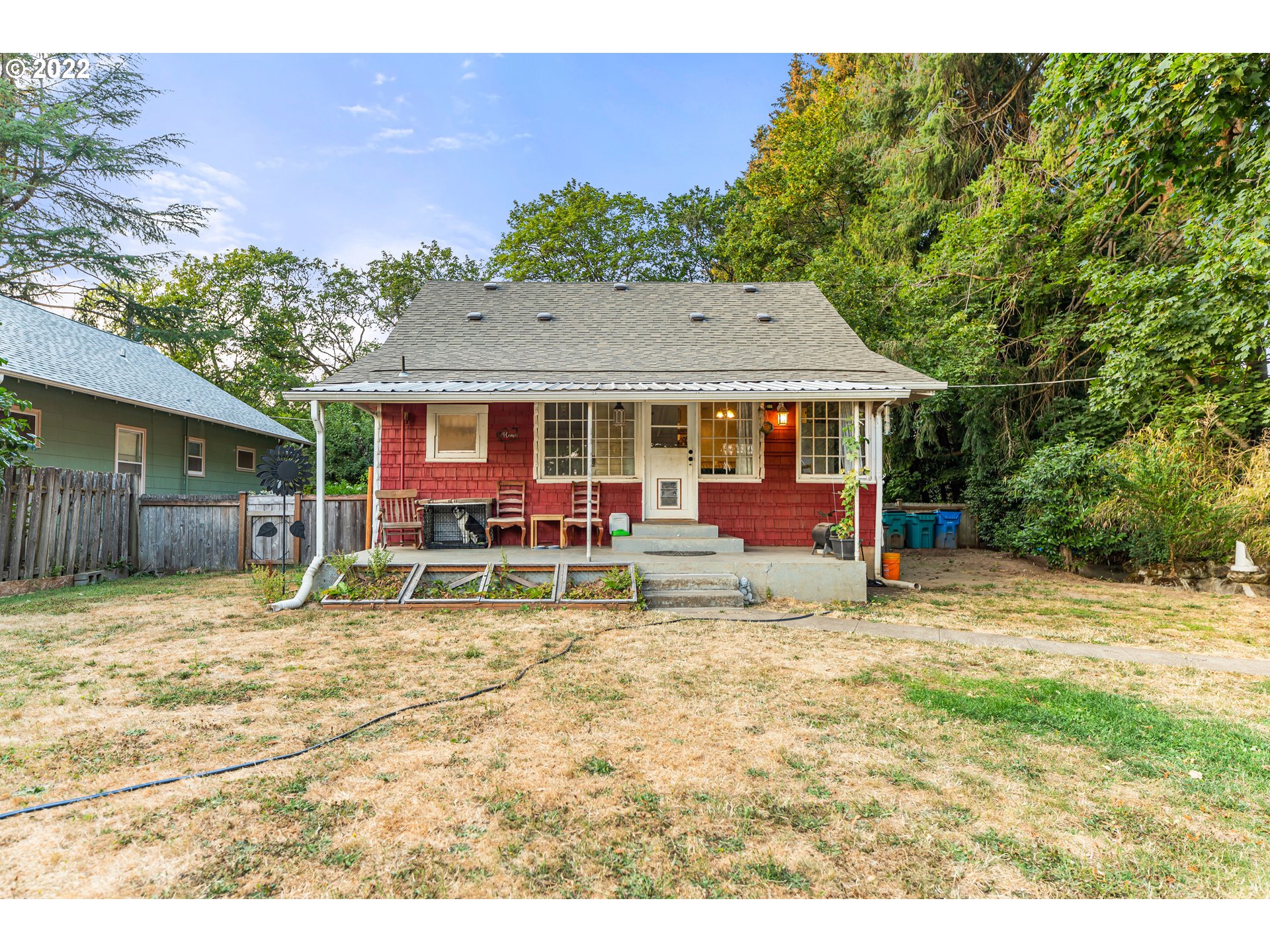 401 Maple Street Ridgefield, WA 98642 - Photo 23 of 31 a view of a house with a yard patio and fire pit
