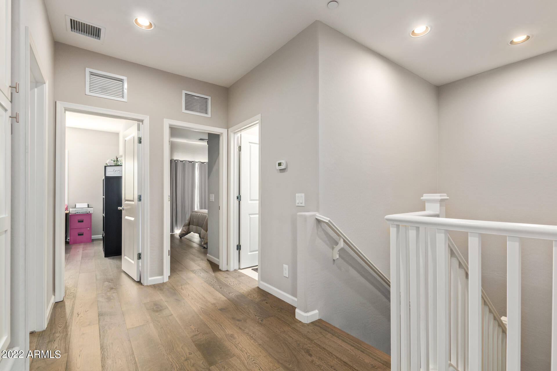 3935 East Rough Rider Road, Unit 1289 Phoenix, AZ 85050 - Photo 46 of 60 a view of entryway with wooden floor