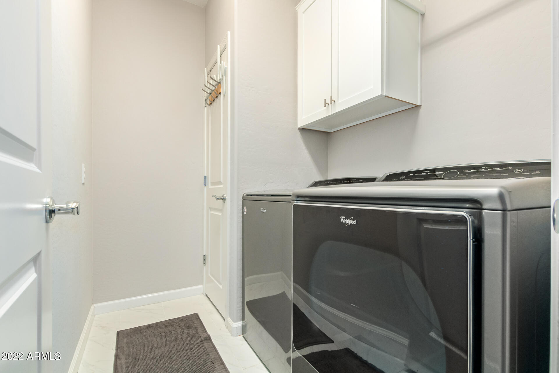 3935 East Rough Rider Road, Unit 1289 Phoenix, AZ 85050 - Photo 47 of 60 a utility room with dryer and washer