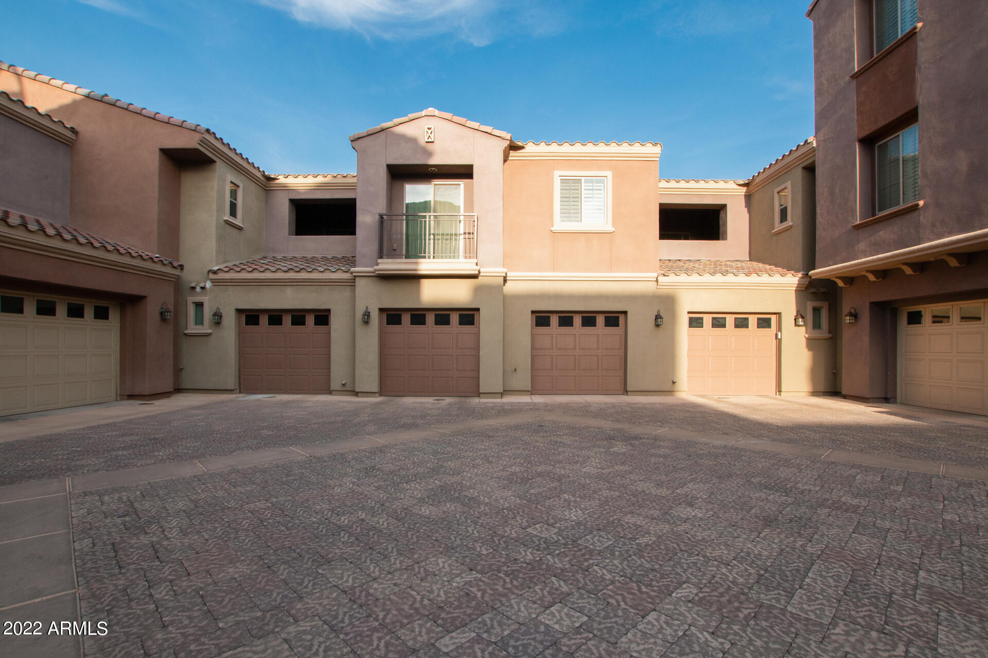 3935 East Rough Rider Road, Unit 1289 Phoenix, AZ 85050 - Photo 48 of 60 a view of a house with a street