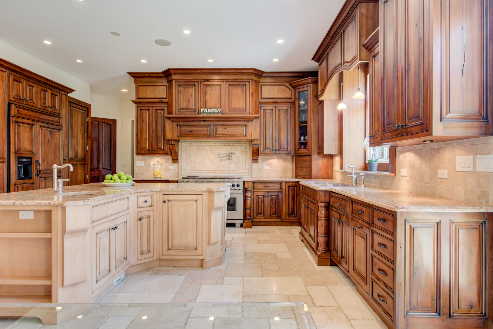 102 Longmeadow Road Winnetka, IL 60093 - Photo 18 of 52 a kitchen with stainless steel appliances granite countertop a sink and cabinets