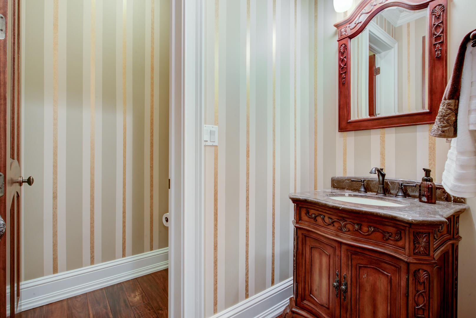 102 Longmeadow Road Winnetka, IL 60093 - Photo 24 of 52 a bathroom with a granite countertop sink and a mirror
