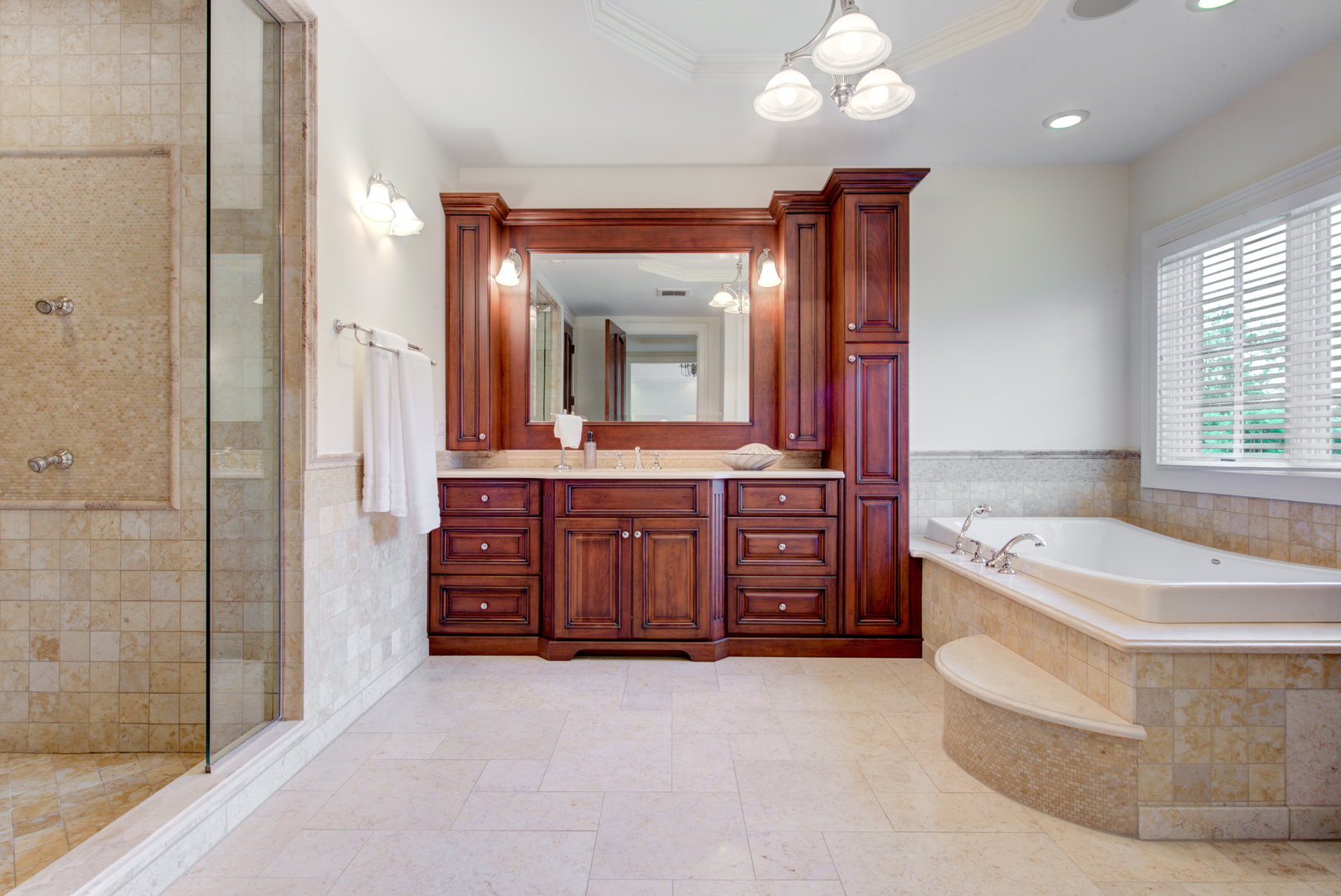 102 Longmeadow Road Winnetka, IL 60093 - Photo 29 of 52 a spacious bathroom with a tub sink and mirror