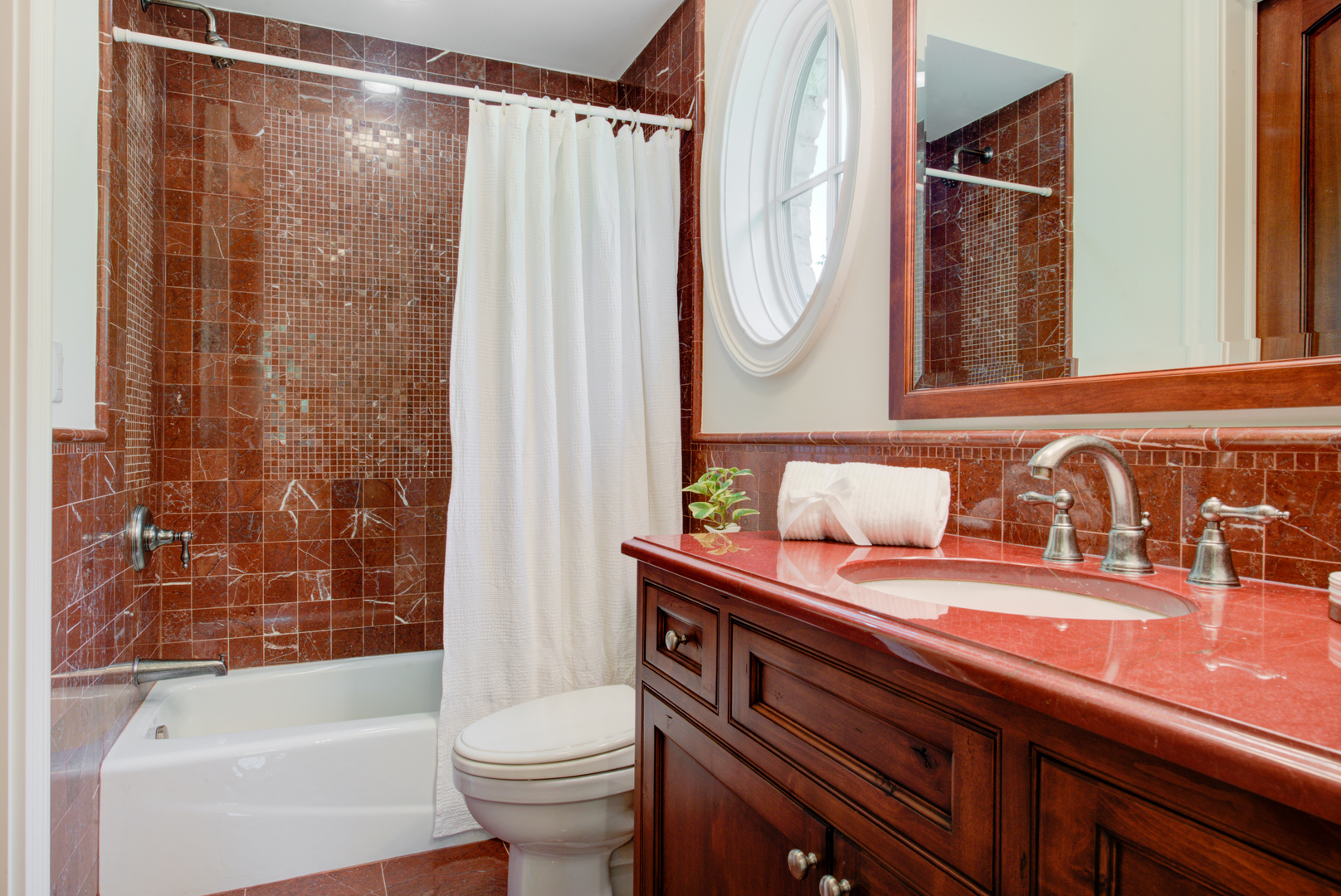 102 Longmeadow Road Winnetka, IL 60093 - Photo 32 of 52 a bathroom with a granite countertop sink a toilet a mirror and shower