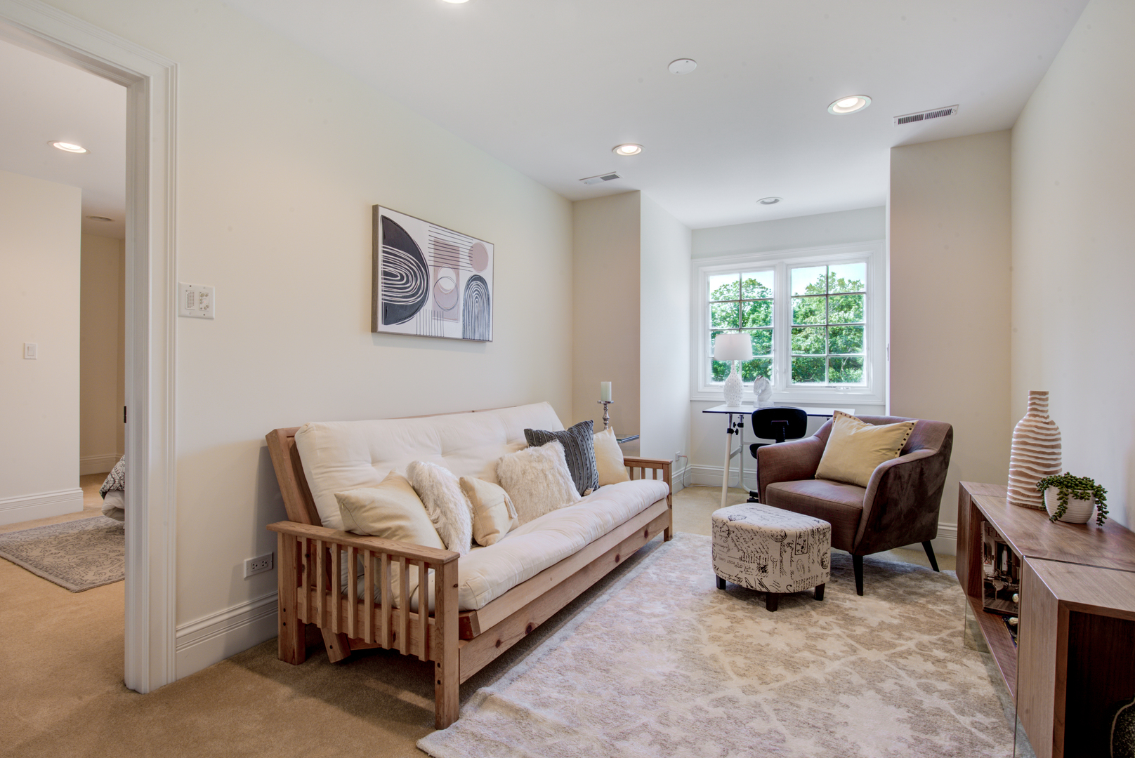 102 Longmeadow Road Winnetka, IL 60093 - Photo 38 of 52 a living room with furniture and a large window