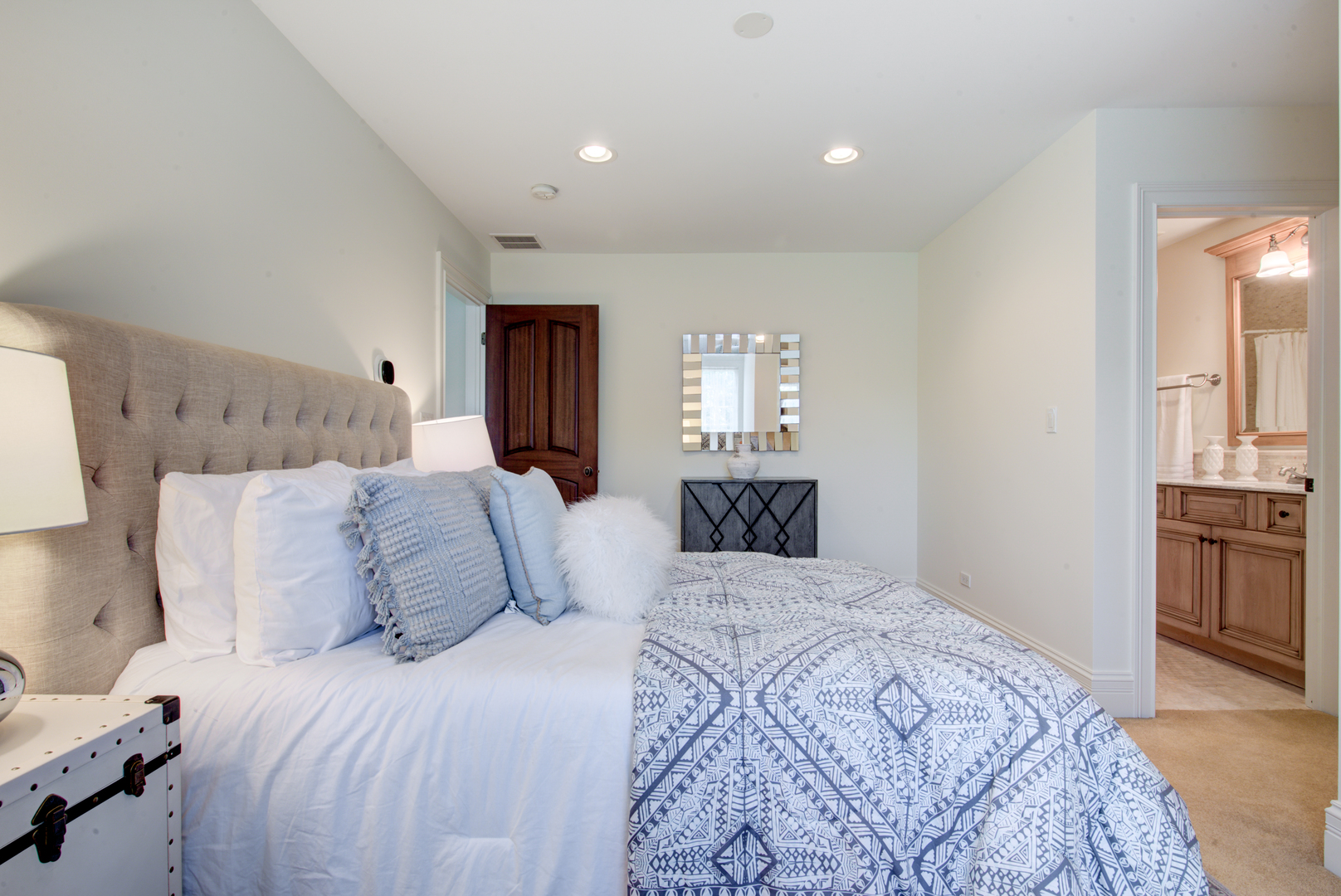 102 Longmeadow Road Winnetka, IL 60093 - Photo 39 of 52 a bedroom with a large bed and a dresser