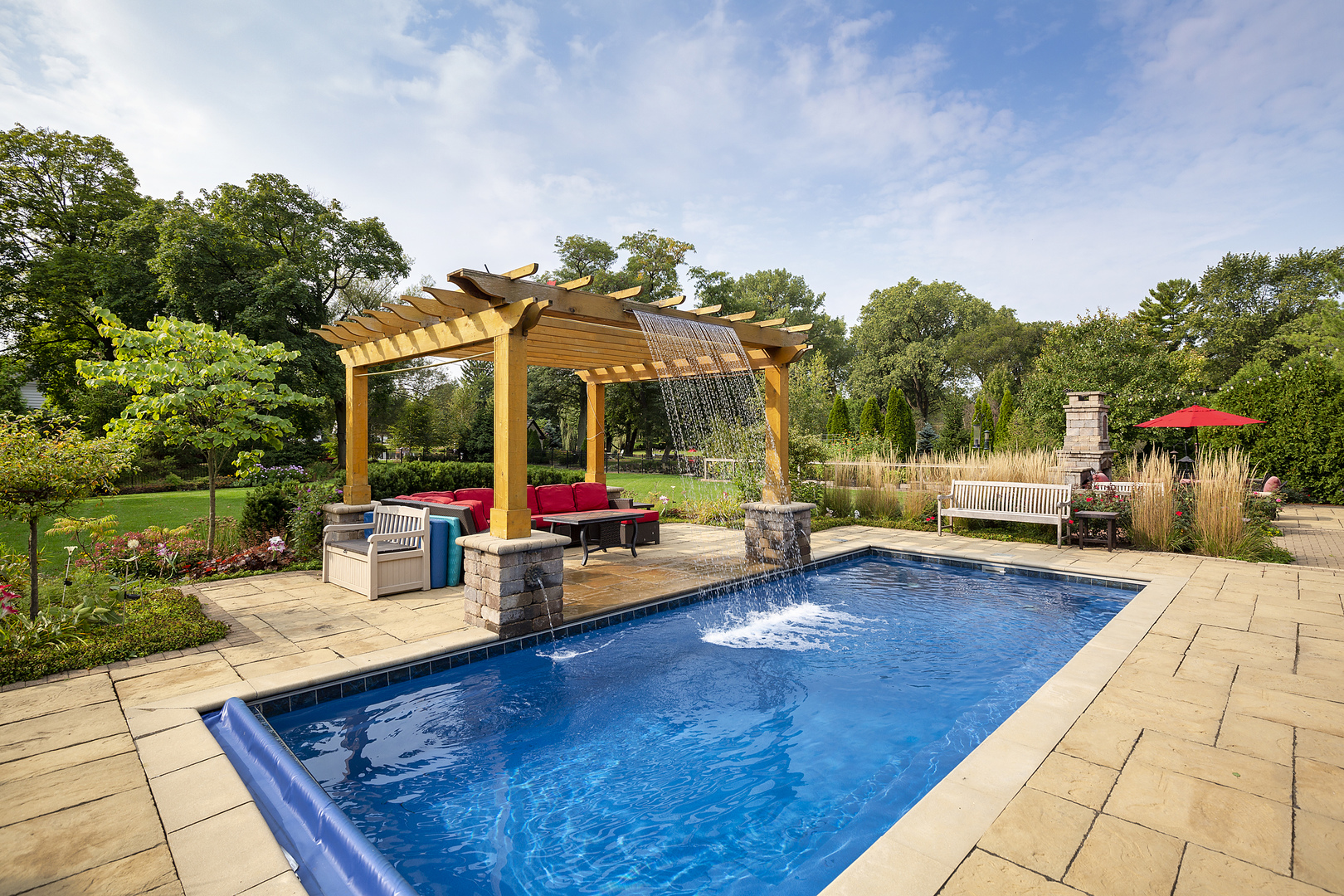 102 Longmeadow Road Winnetka, IL 60093 - Photo 4 of 52 a view of a swimming pool with a patio