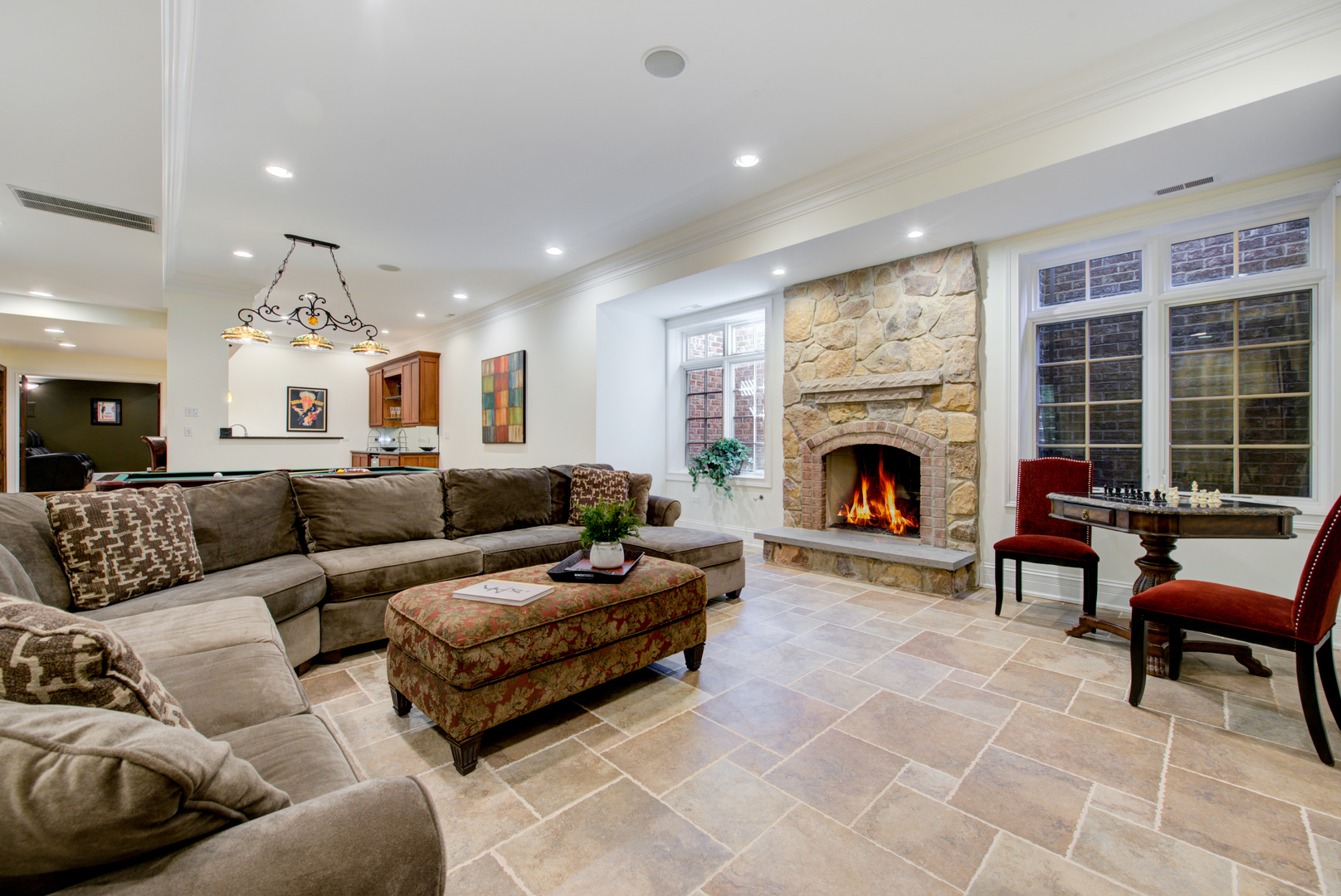 102 Longmeadow Road Winnetka, IL 60093 - Photo 42 of 52 a living room with furniture and a fireplace