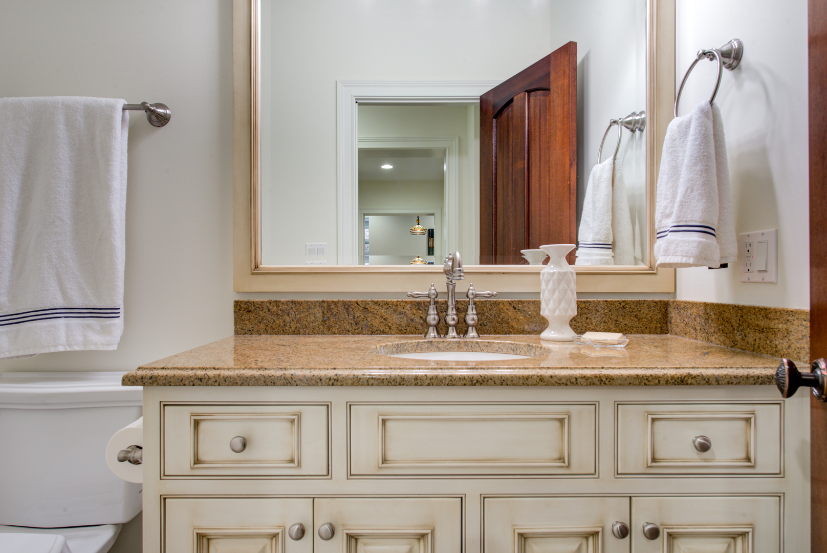 102 Longmeadow Road Winnetka, IL 60093 - Photo 48 of 52 a bathroom with a granite countertop sink and a mirror