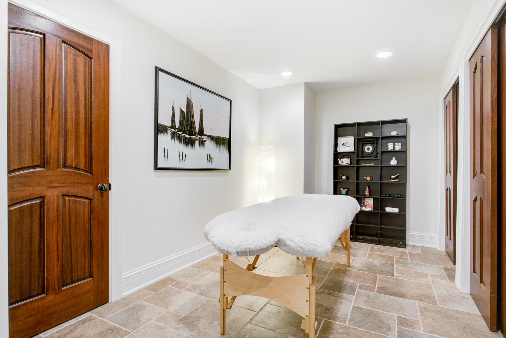 102 Longmeadow Road Winnetka, IL 60093 - Photo 49 of 52 a view of a room with shelves and furniture