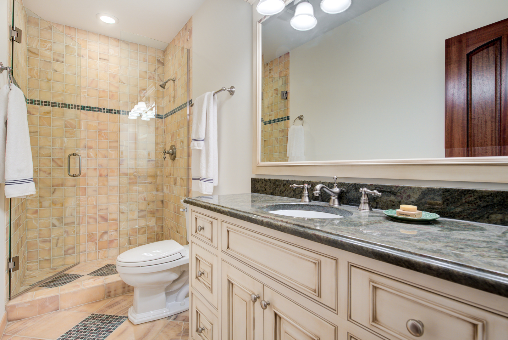 102 Longmeadow Road Winnetka, IL 60093 - Photo 52 of 52 a bathroom with a granite countertop sink toilet and shower