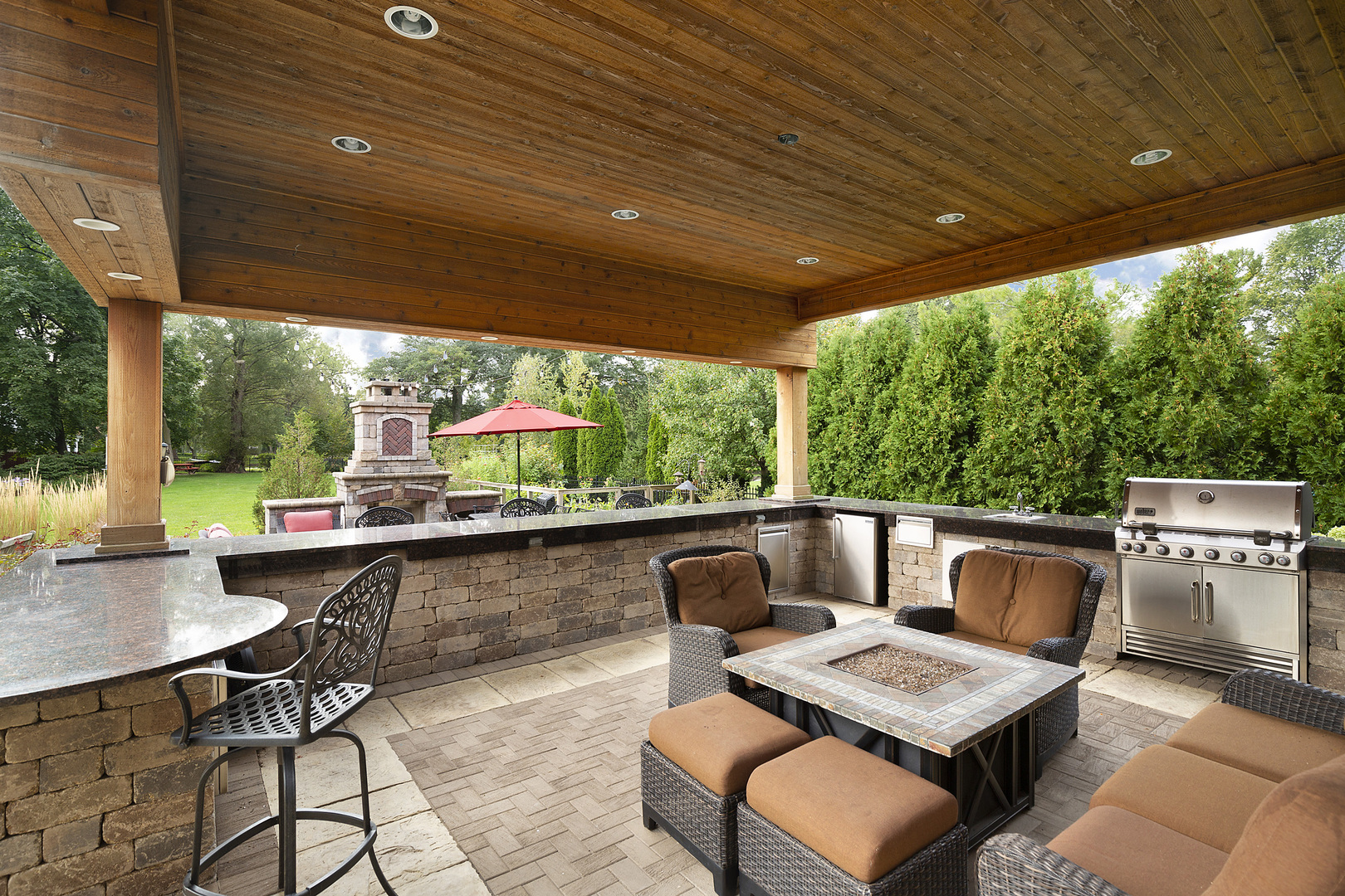 102 Longmeadow Road Winnetka, IL 60093 - Photo 7 of 52 a view of backyard with outdoor seating and plants