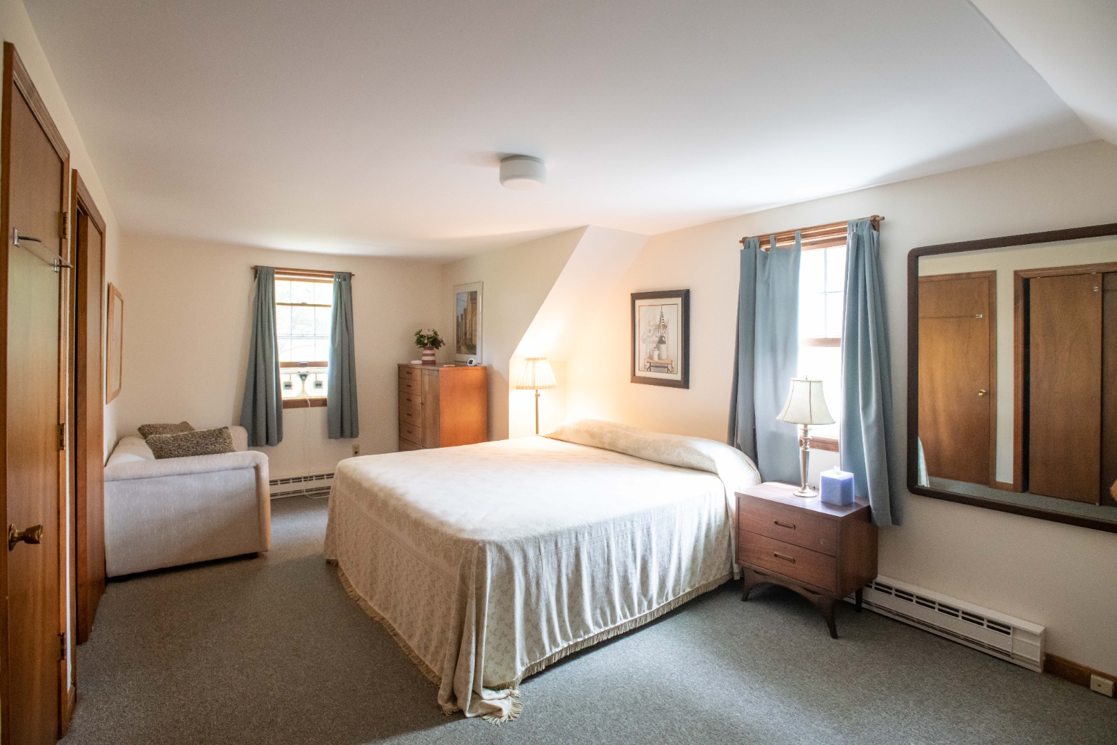 134 Surfside Road Nantucket, MA 02554 - Photo 22 of 24 a bedroom with a bed and a couch