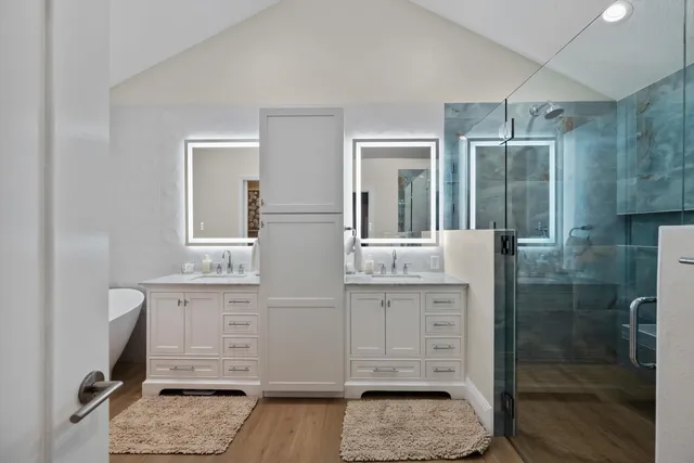 a bathroom with a bathtub and sink