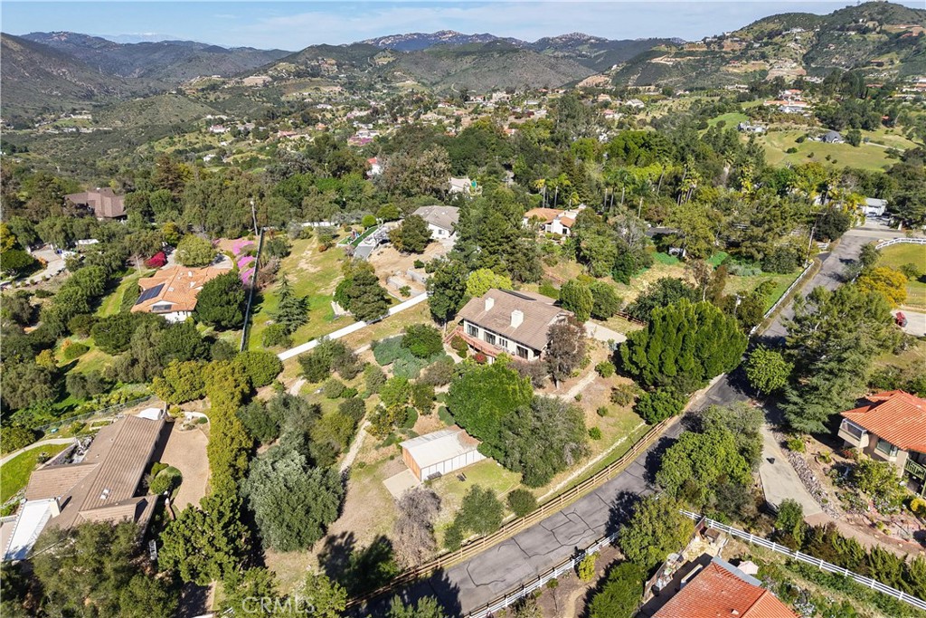 2248 Mil Sorpresas Drive Fallbrook, CA 92028 - Photo 18 of 74 an aerial view of residential houses with outdoor space and trees