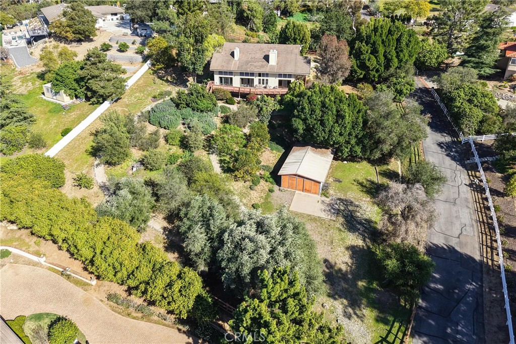 2248 Mil Sorpresas Drive Fallbrook, CA 92028 - Photo 21 of 74 an aerial view of a house with a yard