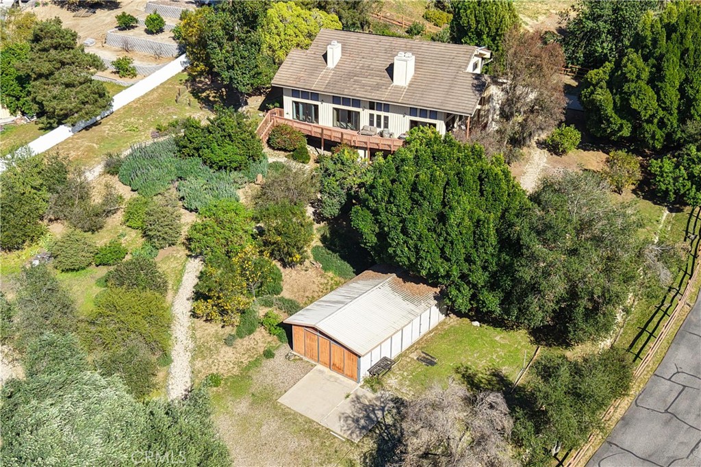 2248 Mil Sorpresas Drive Fallbrook, CA 92028 - Photo 22 of 74 an aerial view of a house with a yard