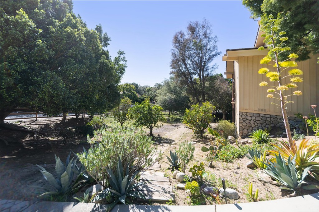 2248 Mil Sorpresas Drive Fallbrook, CA 92028 - Photo 36 of 74 a view of a garden with flowers