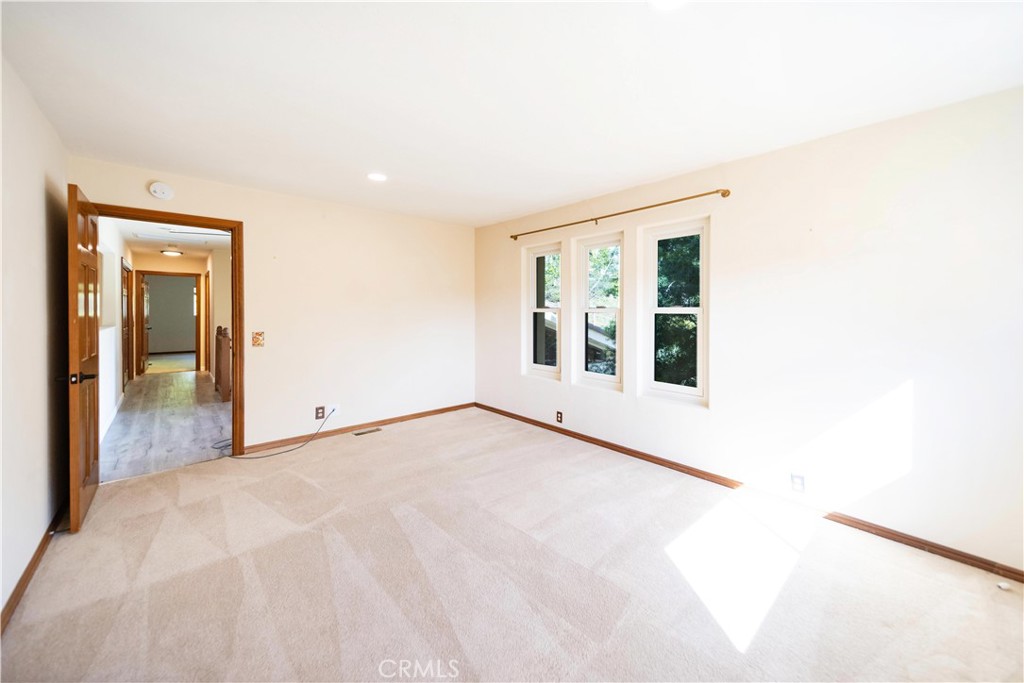 2248 Mil Sorpresas Drive Fallbrook, CA 92028 - Photo 45 of 74 a view of an empty room with glass door