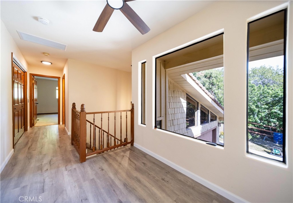2248 Mil Sorpresas Drive Fallbrook, CA 92028 - Photo 49 of 74 a view of entryway and hall with wooden floor