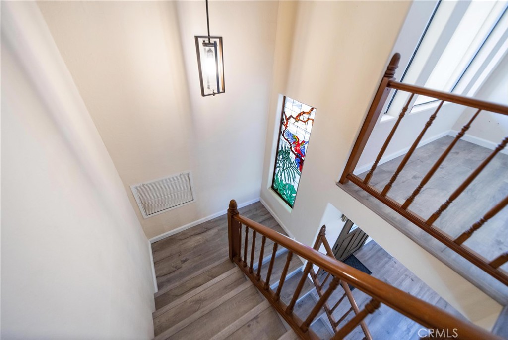 2248 Mil Sorpresas Drive Fallbrook, CA 92028 - Photo 50 of 74 a view of entryway with stairs and wooden floor